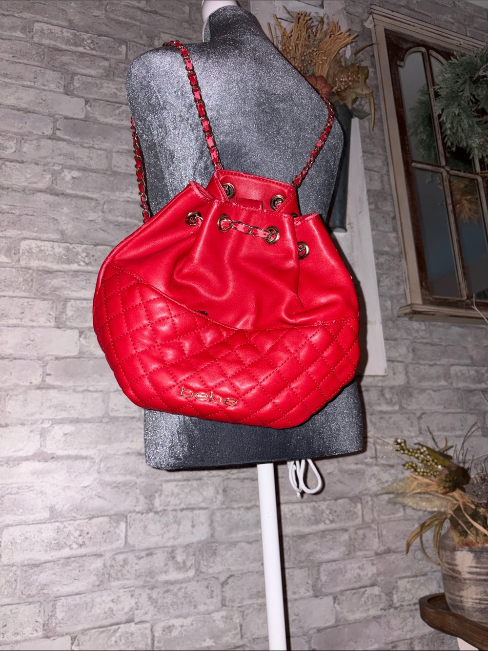 bebe Red Quilted Drawstring Shoulder Bag with Chain Strap Accents